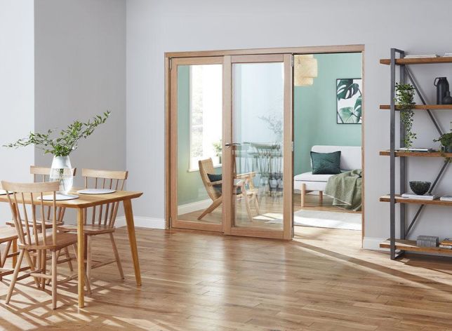 Access door open - Finesse Oak 2.4m (approx 8ft) Internal Bifold Doors - trackless