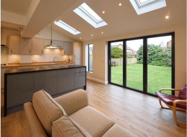 Closed custom grey aluminium bifold doors - Status range